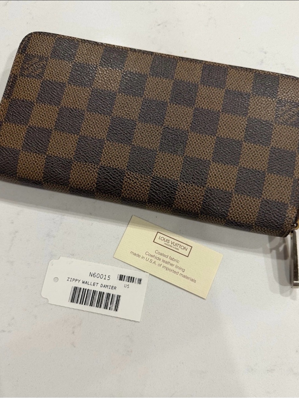 Louis Vuitton Damier Ebene Zippy Wallet in Brown Checkered Canvas
